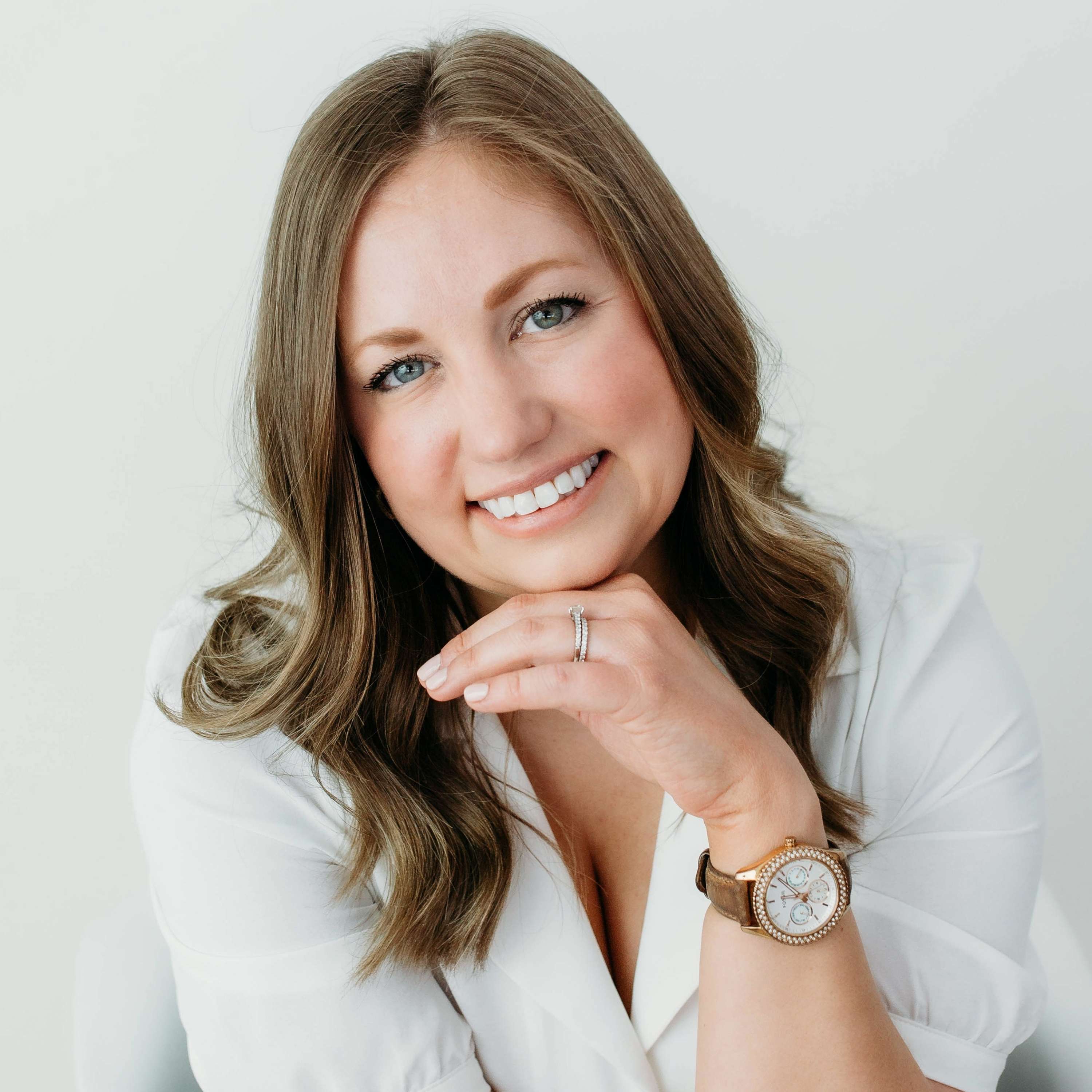 Image of Caitlin Sloan, also known as the Brainy Ballerina, appearing on the Ballet Help Desk Podcast, smiling and talking about her insights and advice on career support for aspiring professional ballet dancers.